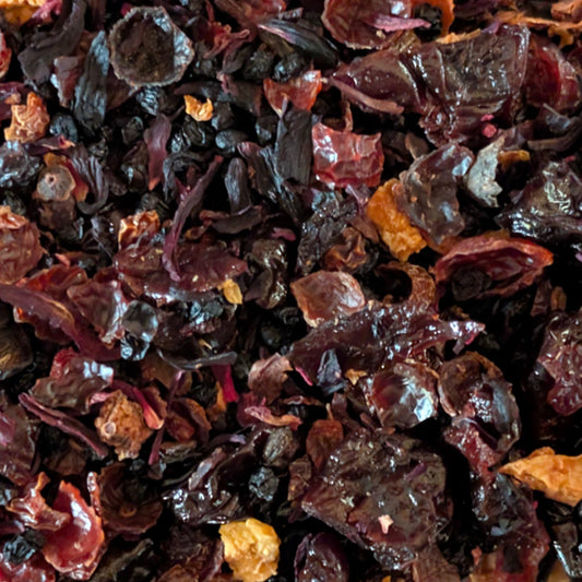 Close-up of dried berries with a dark brown and red color.
