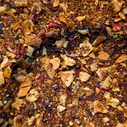 Close-up of a mix of dried herbs and spices with various colors.